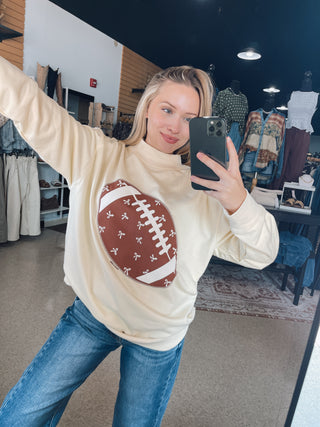 Ivory Bow Football Mock Neck Top